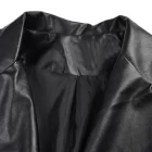 Stylish woman wearing a women’s black leather coat in an urban environment