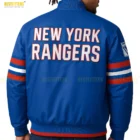 Back view of men’s blue varsity jacket showing clean structured fit, ribbed hem, long sleeves with stripes, and lightweight athletic fabric.