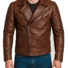 Close-up of diamond-quilted stitching on men’s distressed dark brown leather jacket showing premium craftsmanship, textured finish, and durable construction. Detailed close-up showcasing the diamond-quilted stitching, distressed texture, and premium leather quality of the men’s dark brown motorcycle jacket.