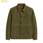 Angled view of The Kooples khaki cotton twill worker jacket showing the side structure, stitching details, and 3-pocket layout for a modern workwear aesthetic. An angled product image that showcases the jacket’s stitching, silhouette, and durable cotton twill build, providing customers with a closer look at craftsmanship and fit.