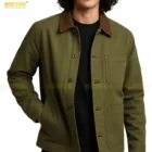 Front view of The Kooples Regular Fit Cotton Twill Worker Jacket in khaki, featuring a minimalist 3-pocket workwear design, durable twill texture, folded collar, and clean utility style. A clear front-angle shot of The Kooples khaki cotton twill worker jacket, showcasing its regular fit, sturdy twill texture, and workwear-inspired triple-pocket construction.