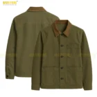 Close-up of the cotton twill fabric texture on The Kooples khaki worker jacket, showing durable weave quality and premium material finish. This close-up image highlights the cotton twill texture, showcasing material quality and durability