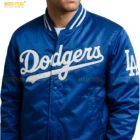Los Angeles Dodgers blue satin jacket by JH Design with embroidered MLB logo, faux leather sleeves, rib-knit trims, and fleece interior displayed on white background